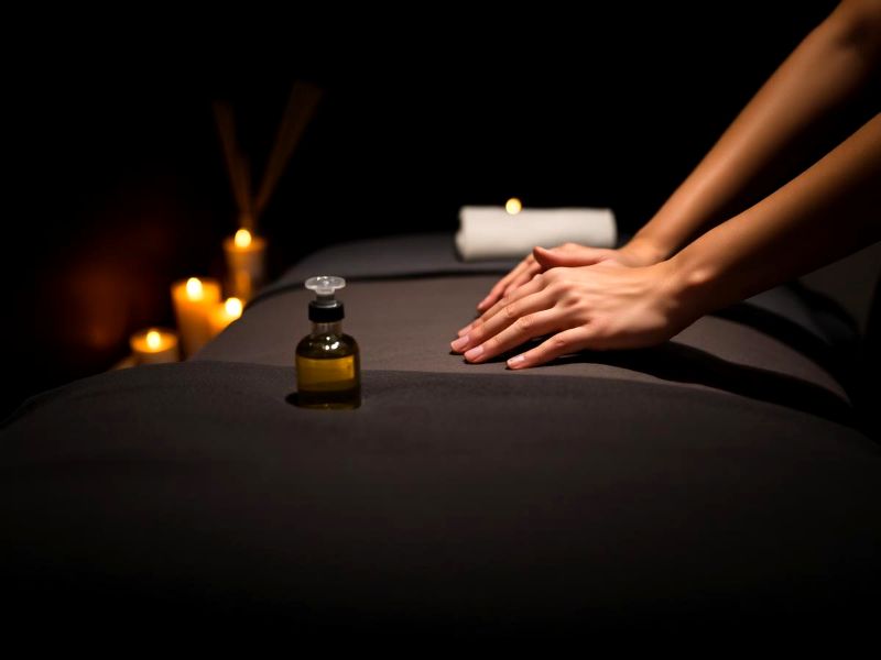 Visuel d’ambiance : table de massage et huile